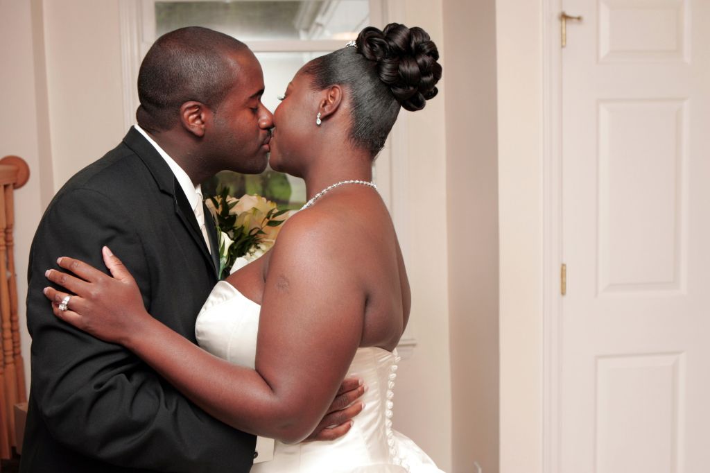 Bride and groom kissing