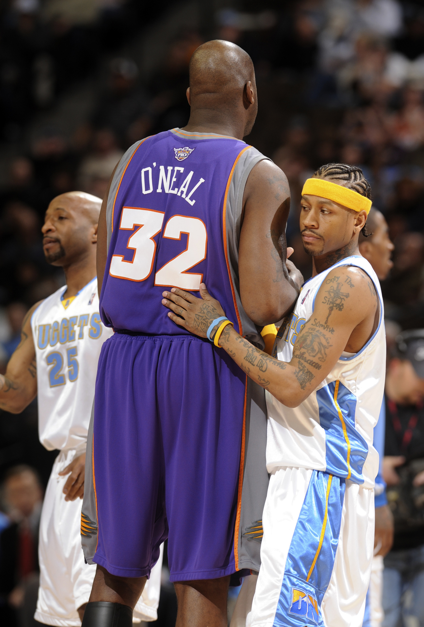 (KG NUGGETS_SUNS -- Nuggets guard Allen Iverson exchanged pleasantries with Phoenix center Shaquille O'Neal before Wednesday's matchup in Denver. The Denver Nuggets hosted the Phoenix Suns Wedensday, March 5, 2008 at the Pepsi Center. The Denver Post/ Kar