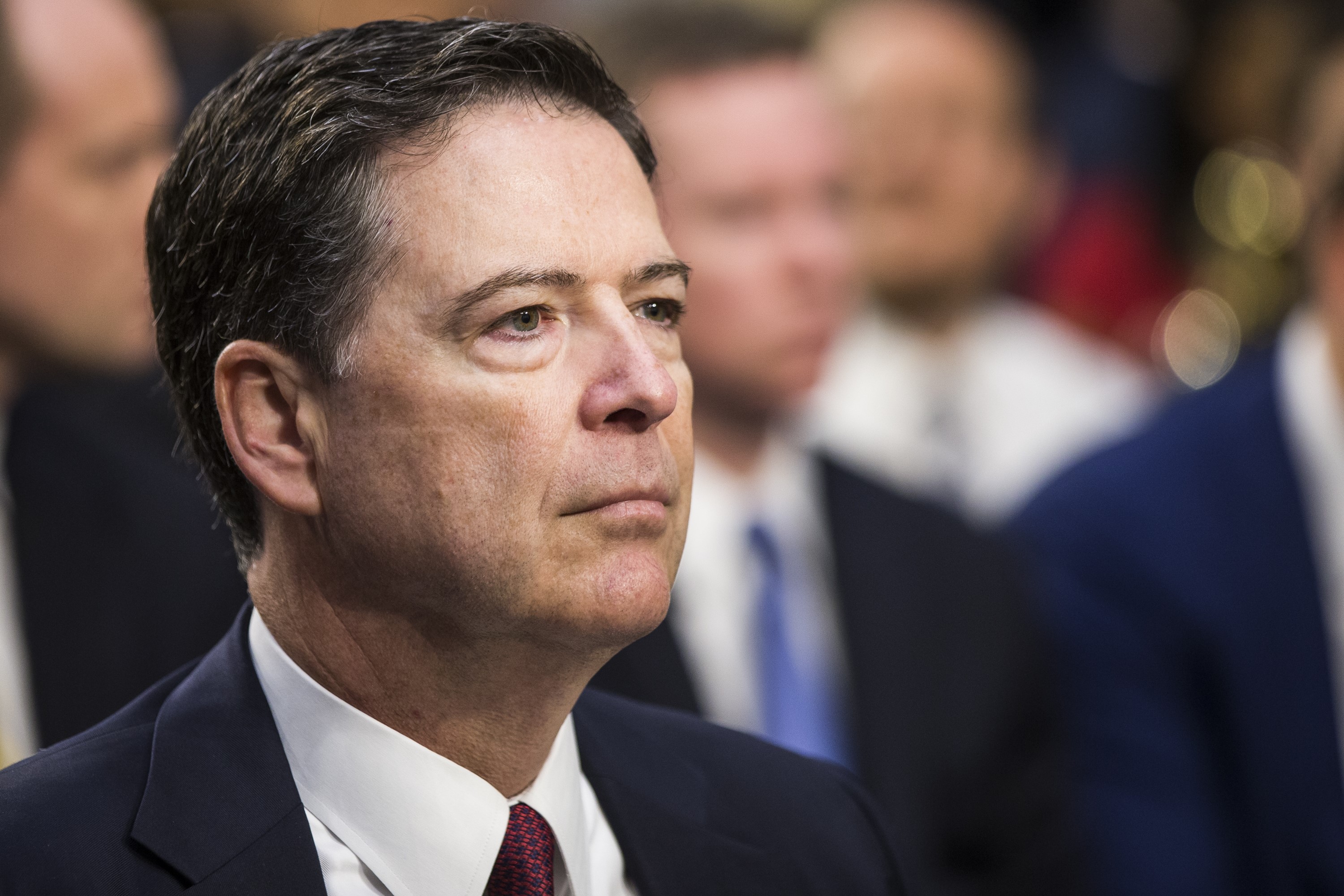 Former FBI Director James Comey testifies before Congress