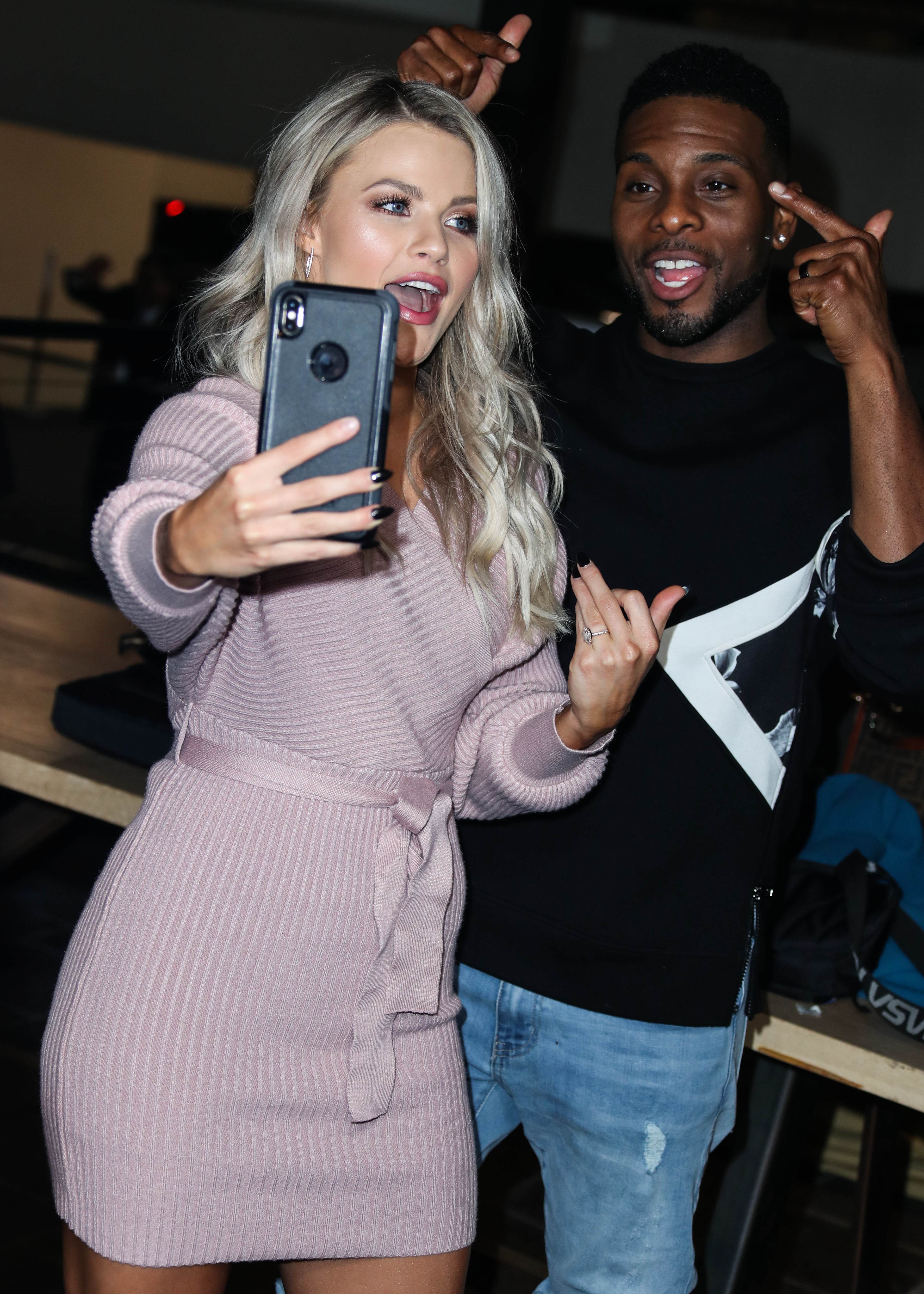 Witney Carson and Kel Mitchell arrive at ABC's 'Dancing With The Stars' Season 28 Top Six Finalists Party held at Dominique Ansel at The Grove on November 4, 2019 in Los Angeles, California, United States.