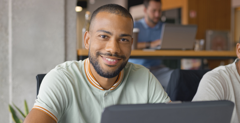 Close-up of businessman sitting in office