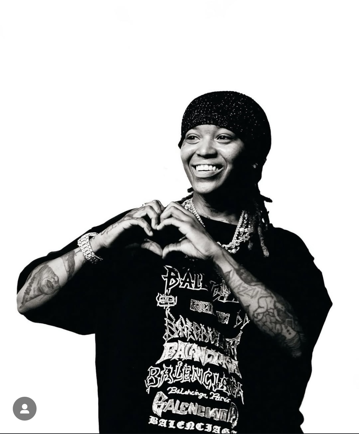 Kaash Paige Poses For a Photo While On Tour in China